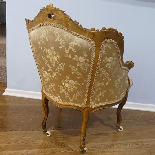 542 - A 19thC French gilt painted wood framed Salon Chair, with ornate carving and moulding to the the fra... 