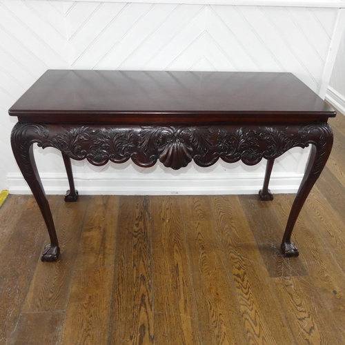 544 - A George II-style Irish mahogany Serving Table, the rectangular top above a heavily moulded frieze w... 