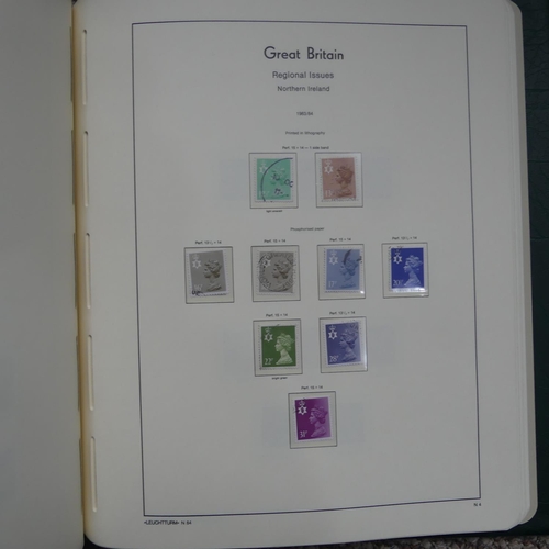 64 - Stamps; A QV to QEII mainly used collection of Great British Stamps, in four boxed Lighthouse albums... 