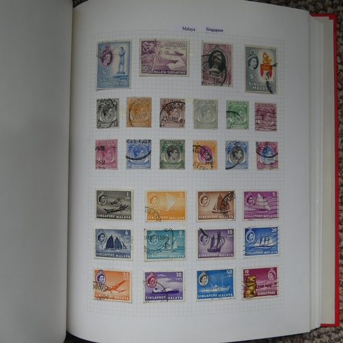 65 - Stamps; A collection of Stamps in eight albums, with mint and used British Empire including Falkland... 