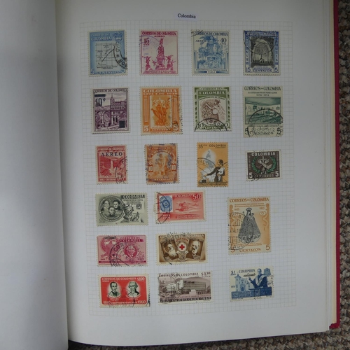 65 - Stamps; A collection of Stamps in eight albums, with mint and used British Empire including Falkland... 