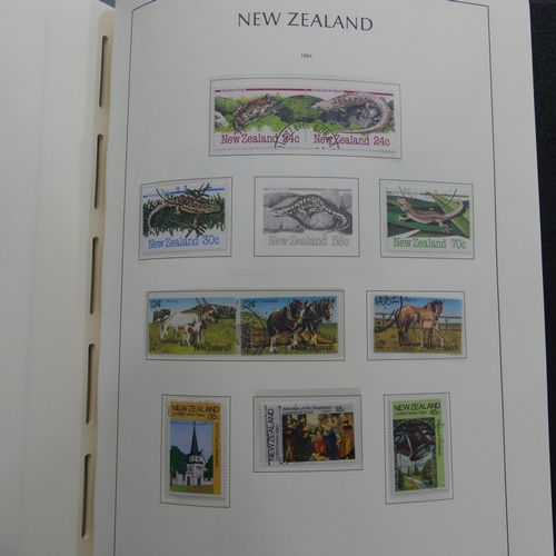 67 - Stamps; A QV to QEII mint and used collection of New Zealand Stamps, in a lighthouse album including... 