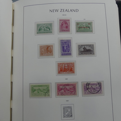 67 - Stamps; A QV to QEII mint and used collection of New Zealand Stamps, in a lighthouse album including... 