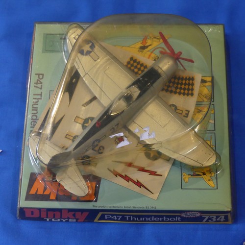 215 - Three boxed Dinky die-cast model Aircraft, comprising a 726 Messerschmitt B.f 109E, a 730 US Navy Ph... 