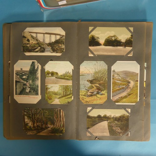 82 - Two early 20thC Postcard Albums, containing UK and Devon topography and greetings cards, together wi... 