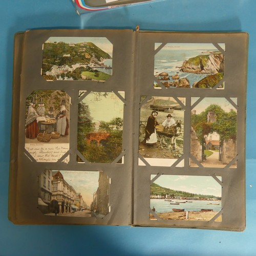 82 - Two early 20thC Postcard Albums, containing UK and Devon topography and greetings cards, together wi... 