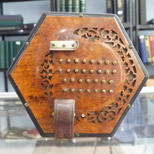 145 - An early 20thC Concertina by Lachenal & Co., serial no. 31235, walnut mounted with 60 buttons (3... 