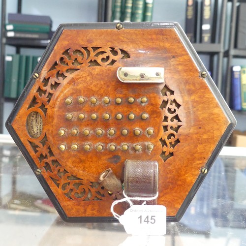 145 - An early 20thC Concertina by Lachenal & Co., serial no. 31235, walnut mounted with 60 buttons (3... 