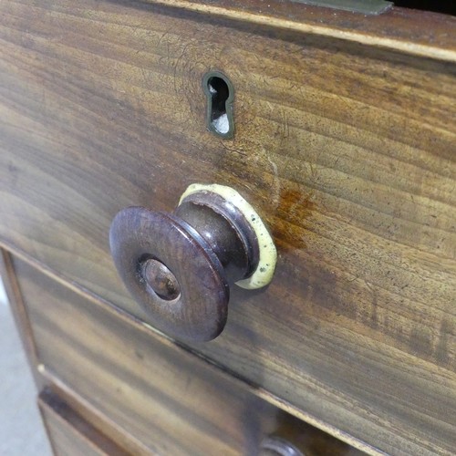 335 - A Georgian mahogany bow-front Chest of Drawers, with two short above three long drawers, graduated i... 