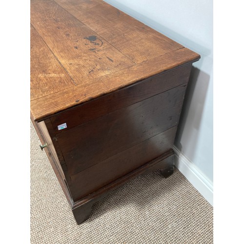 339 - A late 18thC oak Mule Chest, with hinged lid opening to reveal a large compartment, the front with t... 