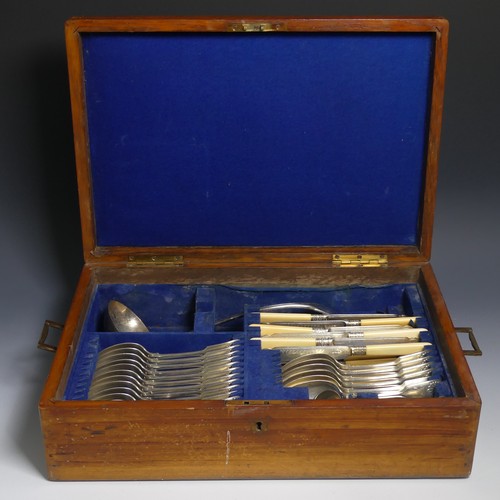 386 - A brass bound oak Canteen of silver plated Cutlery, fiddle, thread and shell pattern, with lift out ... 