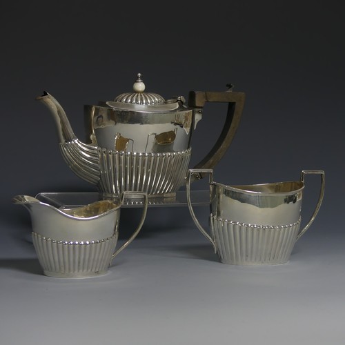 388 - An Edwardian silver 'Bachelor's' Tea Set, by Horace Woodward & Co Ltd., hallmarked Birmingham, 1... 