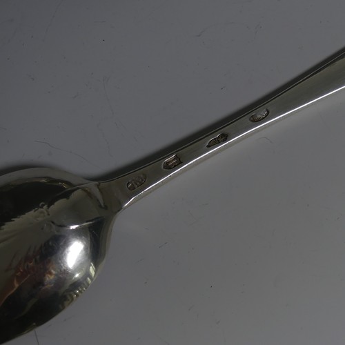 415 - A George III Irish silver Table Spoon, hallmarked Dublin, 1774, with very worn shell reverse, 21.8cm... 