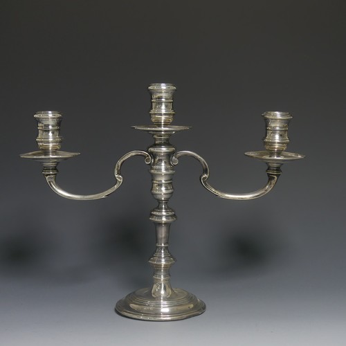 424 - An Elizabeth II silver three light candelabrum, by William Comyns & Sons Ltd., the stick hallmar... 