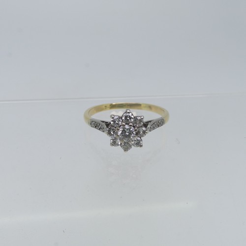 68 - A diamond flowerhead Cluster Ring, the central brilliant cut stone c.¼ct, surrounded by eight smalle... 