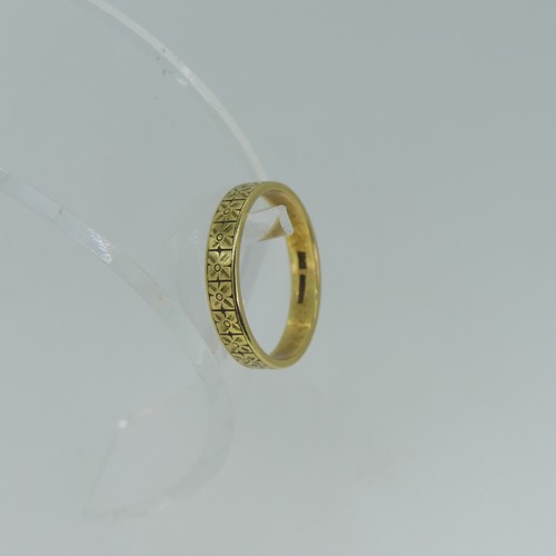 99 - An 18ct yellow gold Band, with foliate engraved decoration, Size R½, together with a plain 18... 