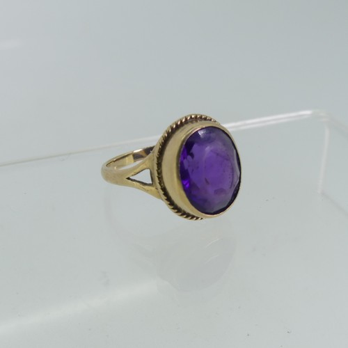 101 - An oval facetted amethyst Ring, mounted in 9ct gold, Size K½, approx total weight 4g, together with ... 