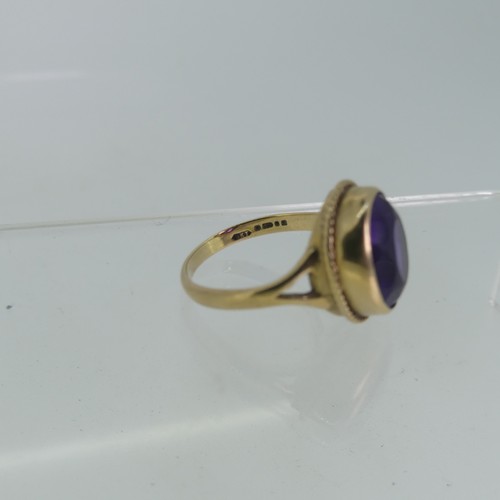 101 - An oval facetted amethyst Ring, mounted in 9ct gold, Size K½, approx total weight 4g, together with ... 