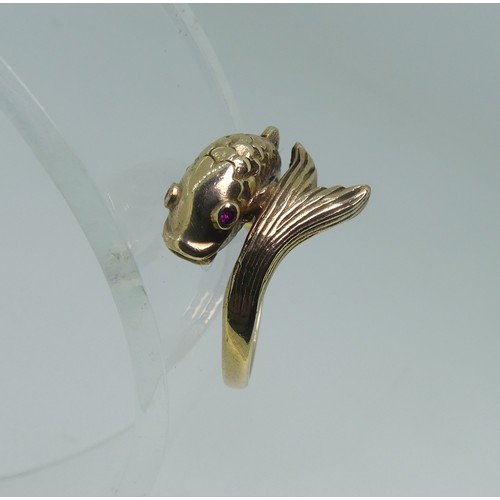 88 - A 9ct gold Dolphin Ring, the head and tail crossing over at the front, with ruby eyes, Size N, 3.8g.... 