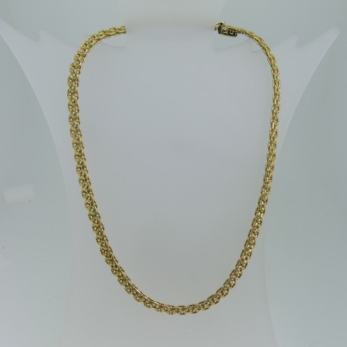 122 - An 18ct yellow gold Collar Necklace, with slightly graduated fancy links, the front 7mm wide, the in... 