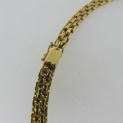 122 - An 18ct yellow gold Collar Necklace, with slightly graduated fancy links, the front 7mm wide, the in... 