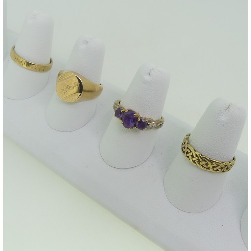 92 - Three 9ct gold Rings; one a textured band, Size O½, one set amethysts, Size O, one with knot front, ... 