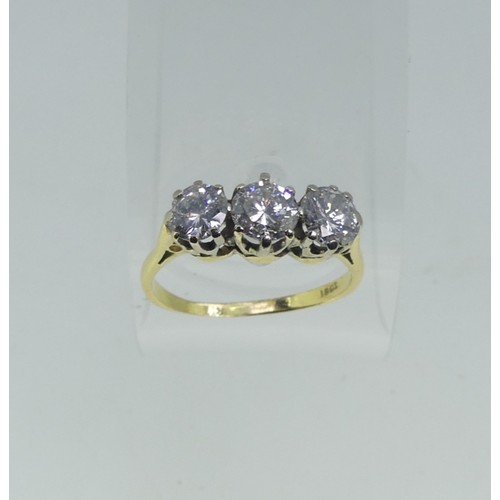 114 - A three stone Diamond Ring, the circular cut centre stone approx 0.56ct, with  a circular cut stone ... 