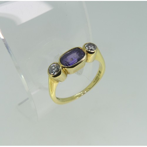 113 - A colour change sapphire and diamond three stone Ring, the central oval sapphire, approx 1ct, with a... 