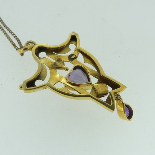 124 - A 9ct yellow gold amethyst and seed pearl Pendant, in the Art Nouveau style, with central heart shap... 