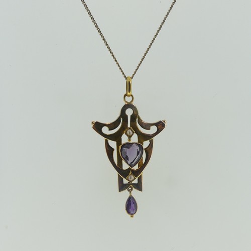 124 - A 9ct yellow gold amethyst and seed pearl Pendant, in the Art Nouveau style, with central heart shap... 