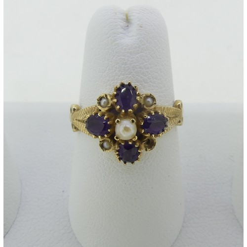 81 - An amethyst and seed pearl flowerhead Ring, mounted in 9ct yellow gold, one seed pearl missing, Size... 