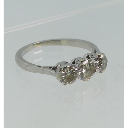 71 - A three stone diamond Ring, the centre stone approx. 0.3ct, with a smaller stone on each side, each ... 