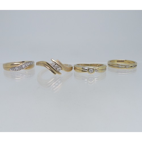 82 - A 9ct yellow gold Ring, the split front set with three small diamonds, Size N, together with two oth... 