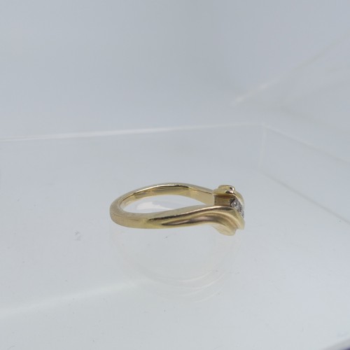 82 - A 9ct yellow gold Ring, the split front set with three small diamonds, Size N, together with two oth... 