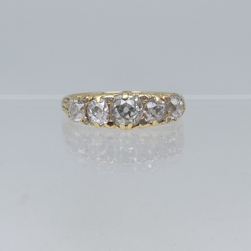 95 - A graduated five stone diamond Ring, the centre stone approx 0.5ct, all mounted in yellow metal in a... 