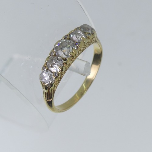 95 - A graduated five stone diamond Ring, the centre stone approx 0.5ct, all mounted in yellow metal in a... 