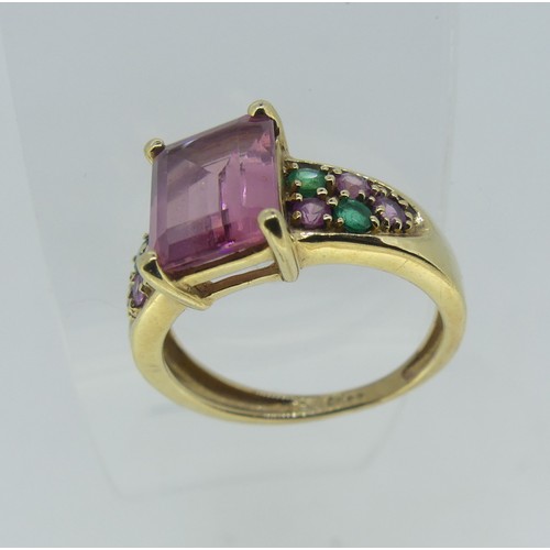 81 - An amethyst and seed pearl flowerhead Ring, mounted in 9ct yellow gold, one seed pearl missing, Size... 