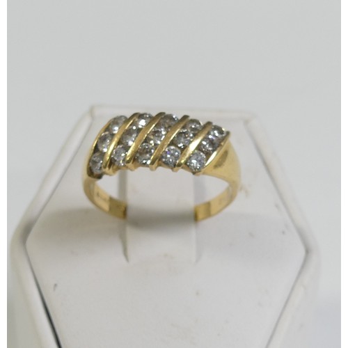 84 - An 18ct yellow gold and diamond Ring, the front with five slanted rows of three diamonds, approx tot... 