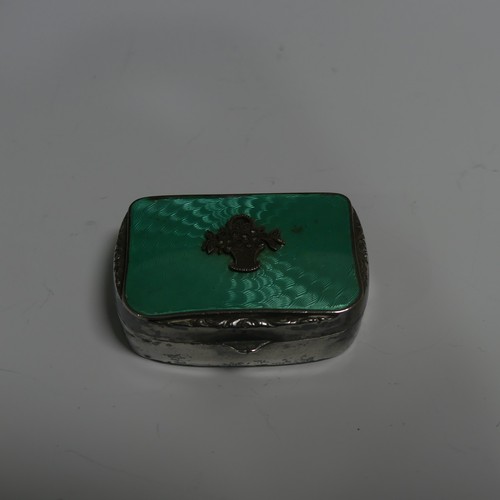 356 - A Continental silver and enamel Pill Box, with London import marks for 1928, the hinged cover with g... 