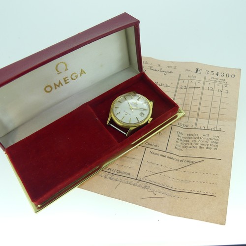 An 18ct gold cased Omega Automatic Chronometer Constellation gentleman’s Wristwatch, the silver dial with raised baton markers, centre seconds and date aperture, signed 24-jewels calibre 561 movement no. 19419060, the case back marked Omega Watch Co. 168005/6 SC-62, case appx. 34mm diameter, no strap but gold-plated buckle is present, with red Omega box.