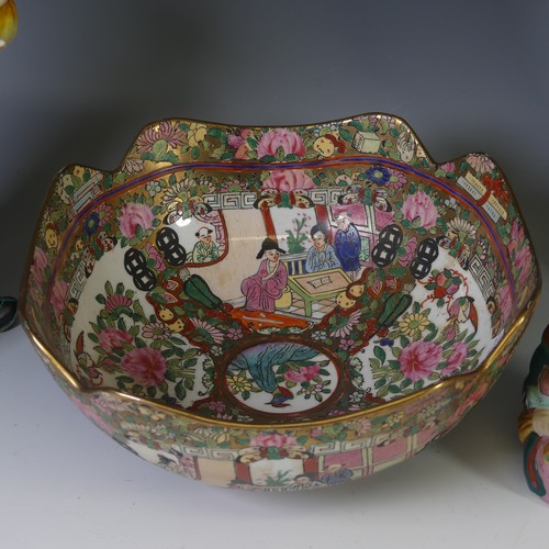 122 - A 20thC Chinese porcelain famille rose Bowl, decorated with figures within a border of flowers, 25cm... 