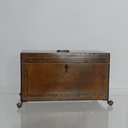 374 - A George III mahogany Tea Caddy, of rectangular form, with hinged lid opening to reveal two metal li... 