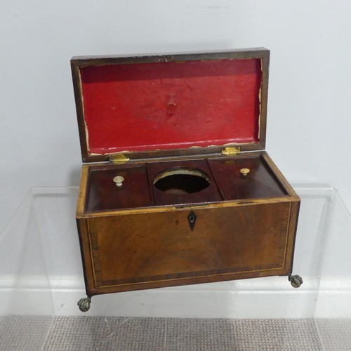 374 - A George III mahogany Tea Caddy, of rectangular form, with hinged lid opening to reveal two metal li... 