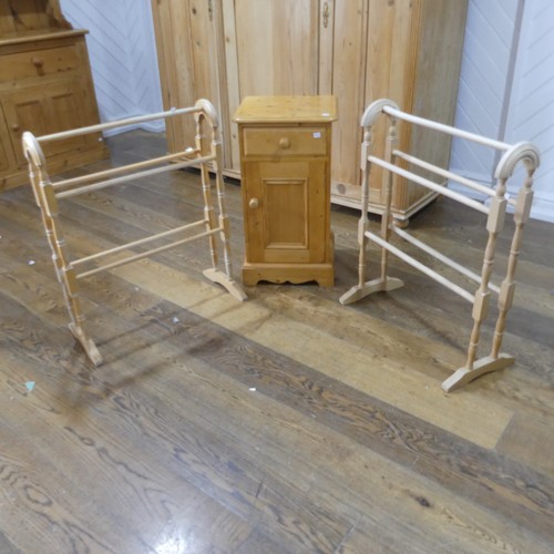 379 - Two pine Towel Rails, W 62cm x H 77cm, together with a modern pine pot cupboard (3)