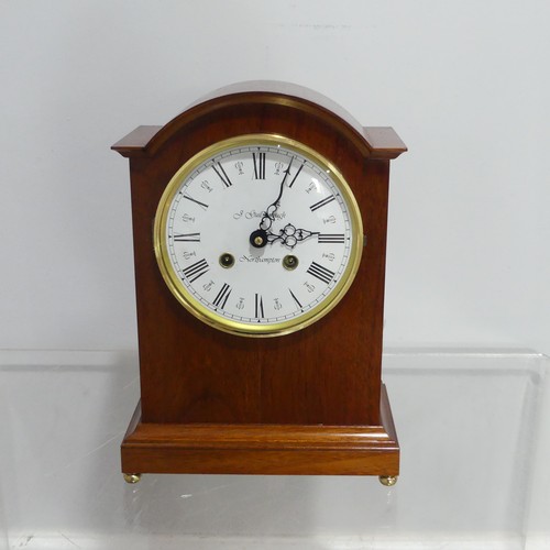 246 - A modern Mantel Clock in the antique style, the white enamelled Roman dial marked 'J Guilsborough, N... 