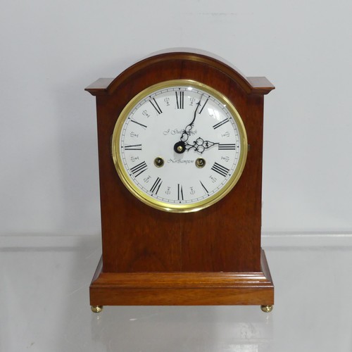 246 - A modern Mantel Clock in the antique style, the white enamelled Roman dial marked 'J Guilsborough, N... 