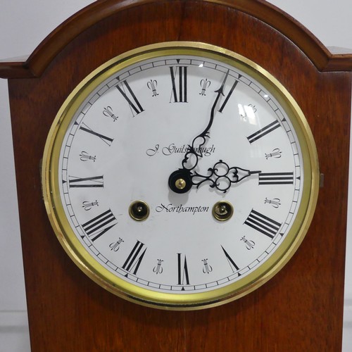 246 - A modern Mantel Clock in the antique style, the white enamelled Roman dial marked 'J Guilsborough, N... 