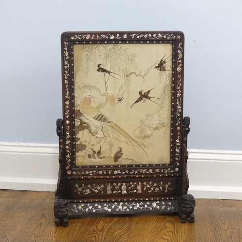 125 - A 19thC Chinese mother of pearl inlaid hardwood Table Screen, the hardwood frame carved with dogs of... 