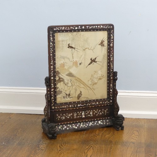 125 - A 19thC Chinese mother of pearl inlaid hardwood Table Screen, the hardwood frame carved with dogs of... 