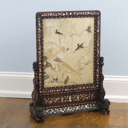 125 - A 19thC Chinese mother of pearl inlaid hardwood Table Screen, the hardwood frame carved with dogs of... 